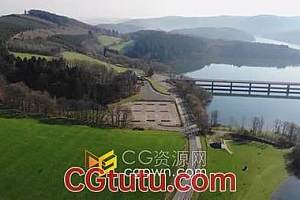 实拍素材-春意盎然无人机飞越湖边公路自然景观鸟瞰图