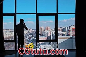 一位男性商人在窗户前打电话4K分辨率实拍视频